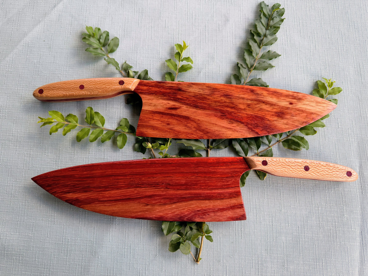 Two beautiful exotic marbled padauk serving knives.
