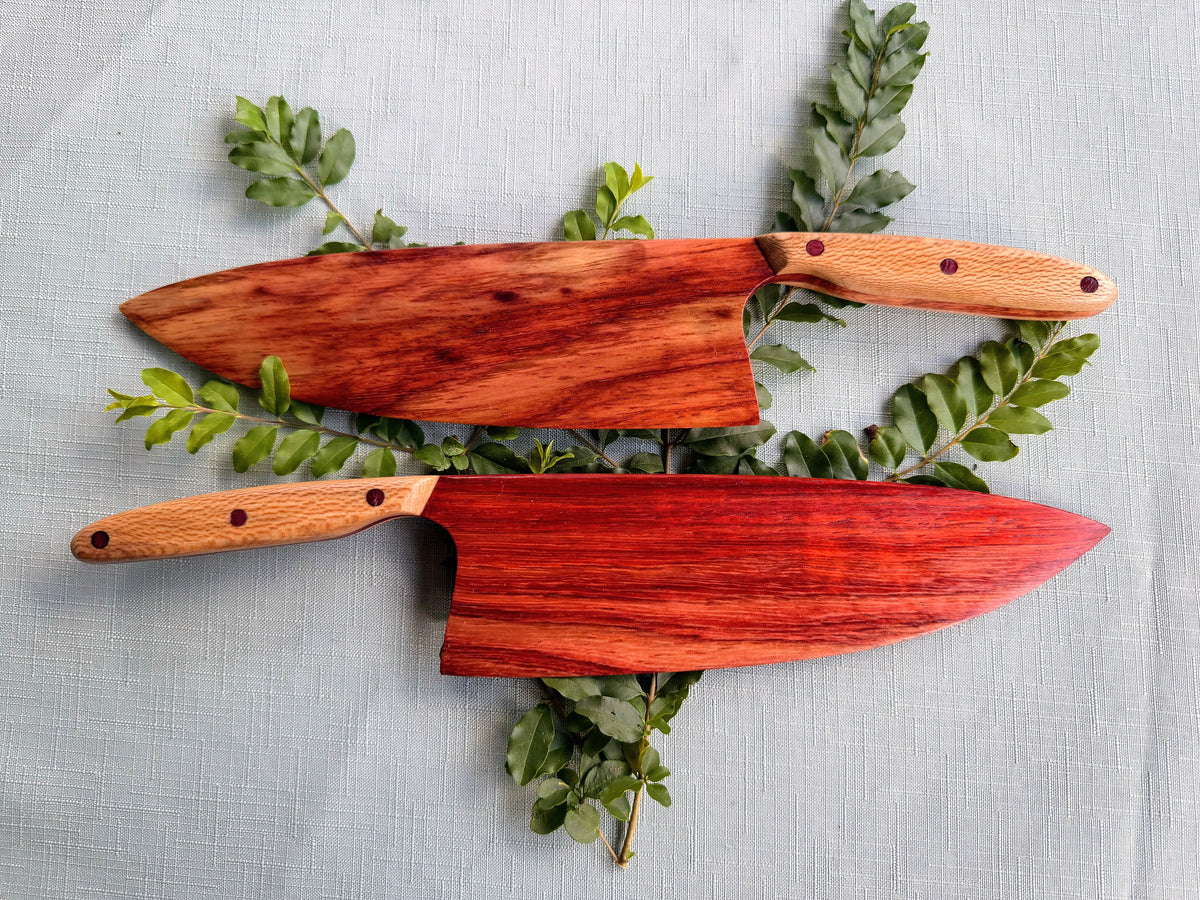 Two beautiful exotic marbled padauk serving knives.